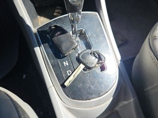 2012 Hyundai Accent SE - Interior Steering Wheel With Keys Image